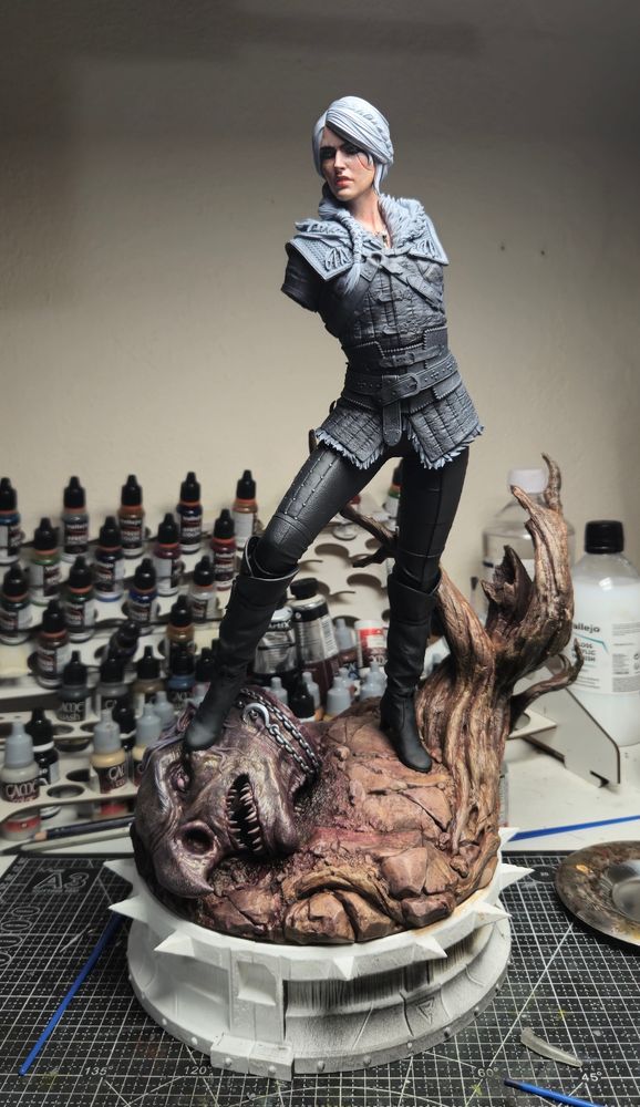 A half painted sculpture of Ciri from the Witcher 4 
