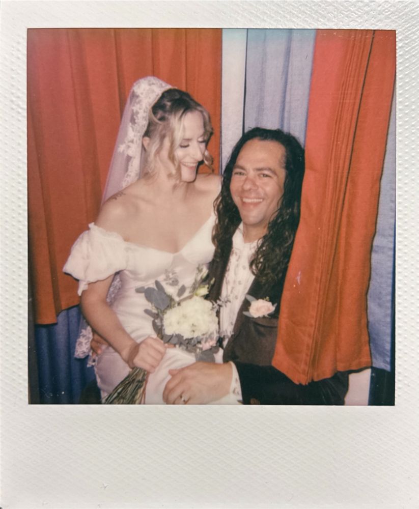 Me sitting on his lap in an old school Photo Booth. We’re both laughing awkwardly lol