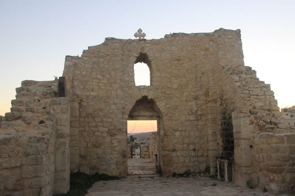 Remnants of a stone church building in Taybeh. 