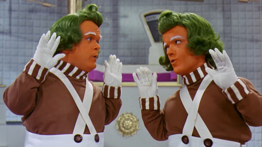 Two Oompa-Loompas from the first Wonka movie. 