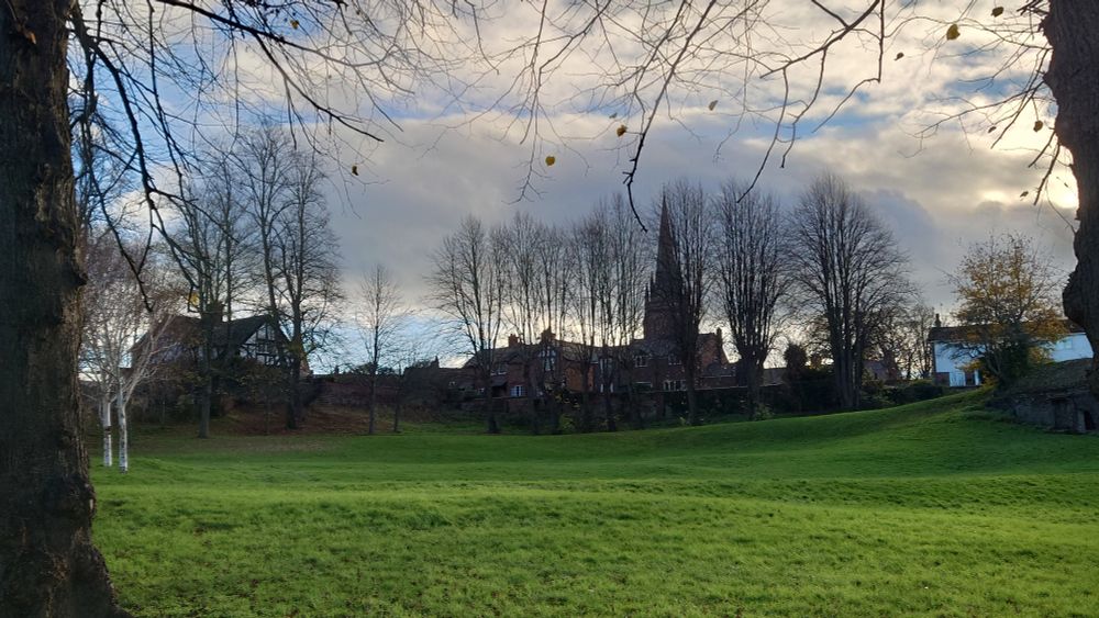 Handbridge St Mary Without the Walls, see from the entrance to Edgard's fields, hidden behind the trees (poplars??) and bathed in Autumn light (yes, 30th of November is still Autumn you calendar heatens!)