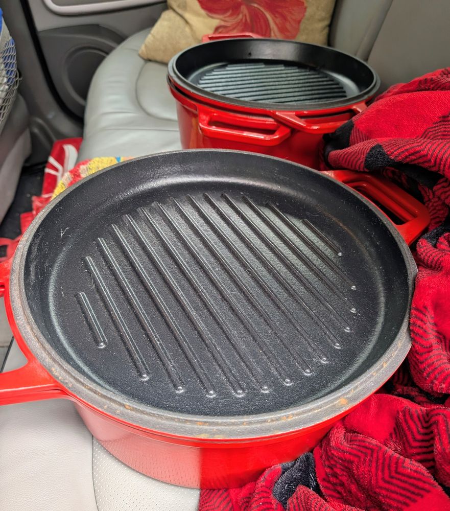 Two large enameled cast iron pots.