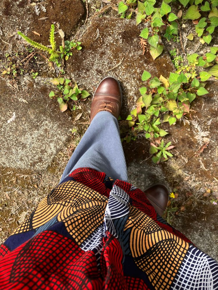 Looking down at my new Zuri over a slate gray trouser leg and brown shoe.