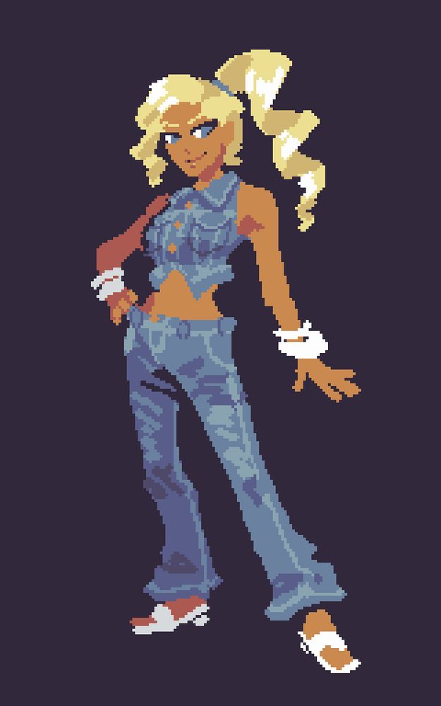 A thin, tan skinned woman with blue eyes and blond hair done in a curled ponytail. She is wearing a cropped denim vest and denim pants, white sandals, and white bangles.
