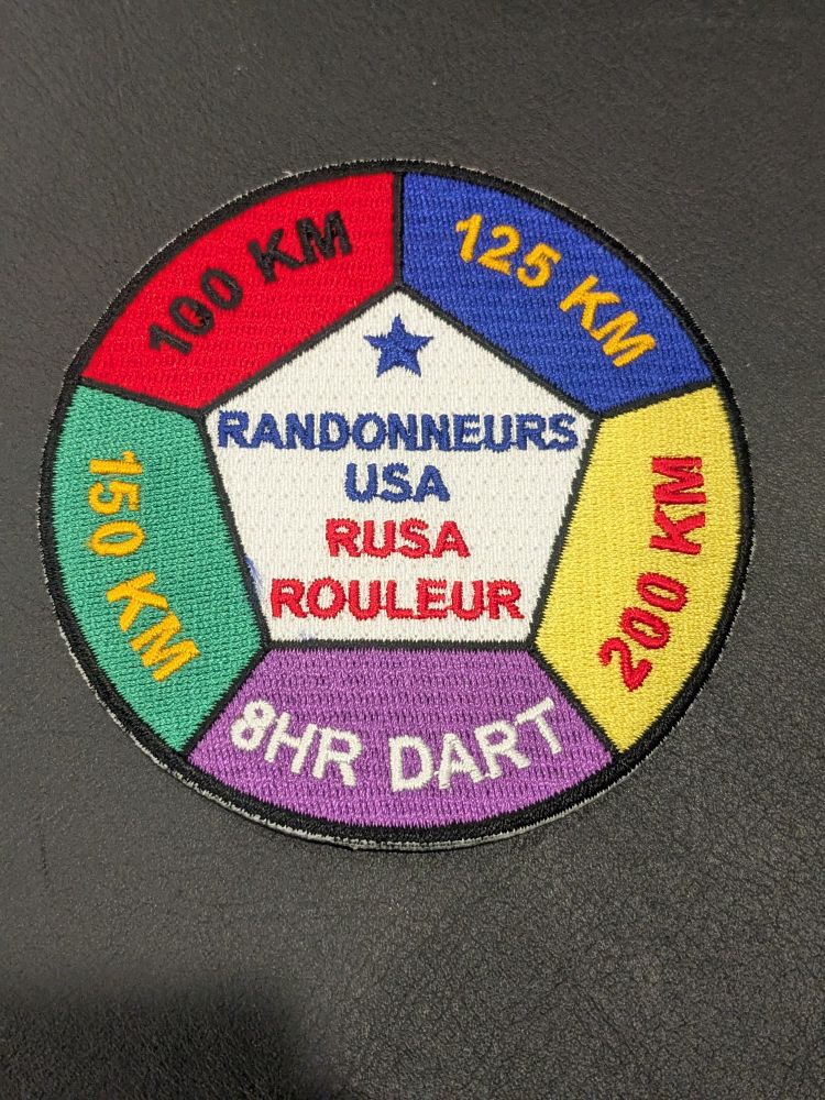 Circular patch showing 5 colored regions 100km, 125km, 150km, 200km, and 8hr dart