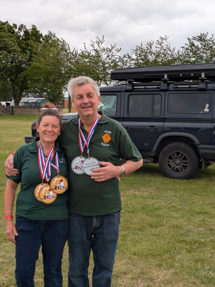 Jan and Chris Shakespeare with their Hacky Racer medal haul. Jan has three firsts! She won moxie, racing and the overall event.