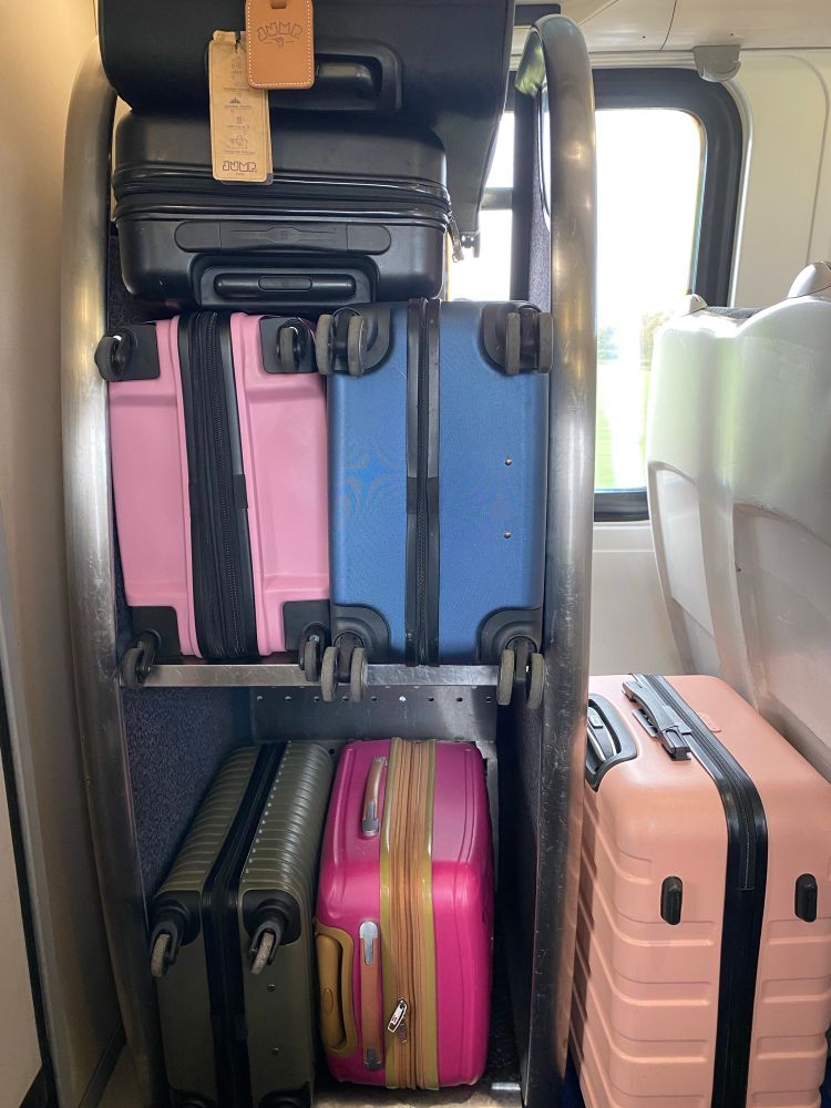 Full luggage rack on train