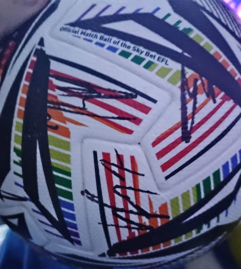 Close-up with signatures and ‘Official Match Ball of the Sky Bet EFL’