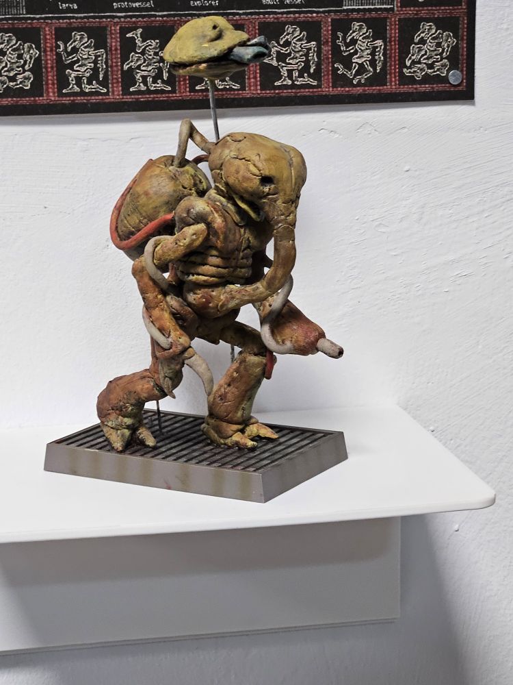 A statue of a crearure from Plastiboo's "Godhusk"
