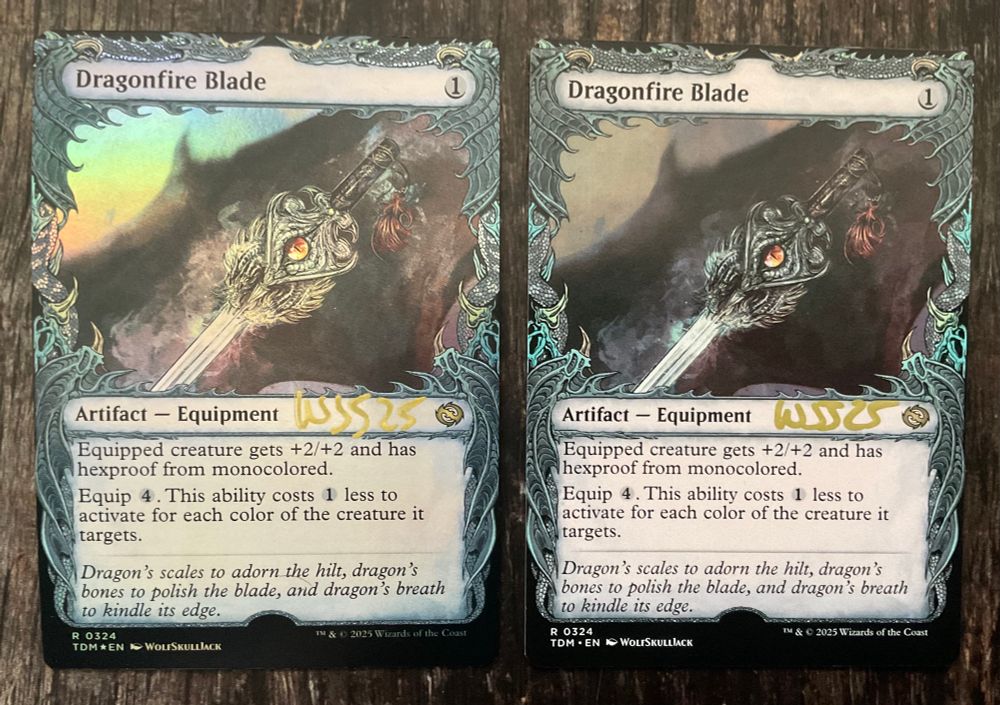 A foil and standard Magic the Gathering card ‘Dragonfire Blade’ 