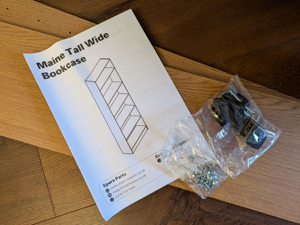 Bits of flatpack bookcase plus instructions and bag of assorted bits and screws. I do indeed check I have all the bits before I start!