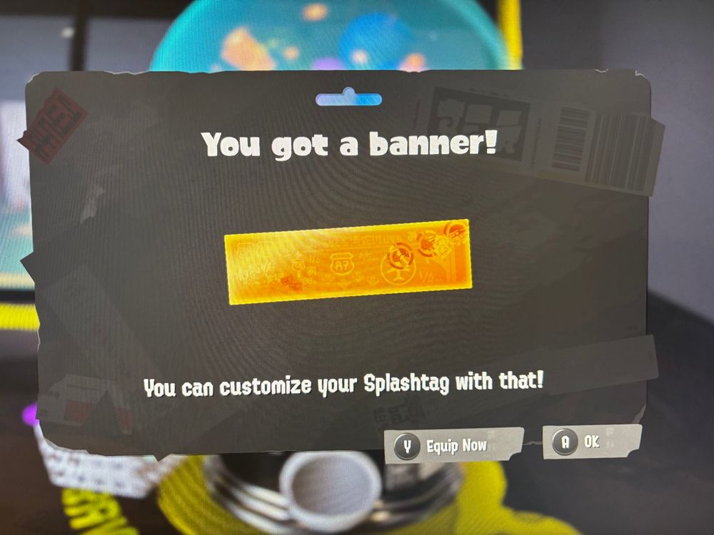 photograph of splatoon shell out machine gold banner pull
