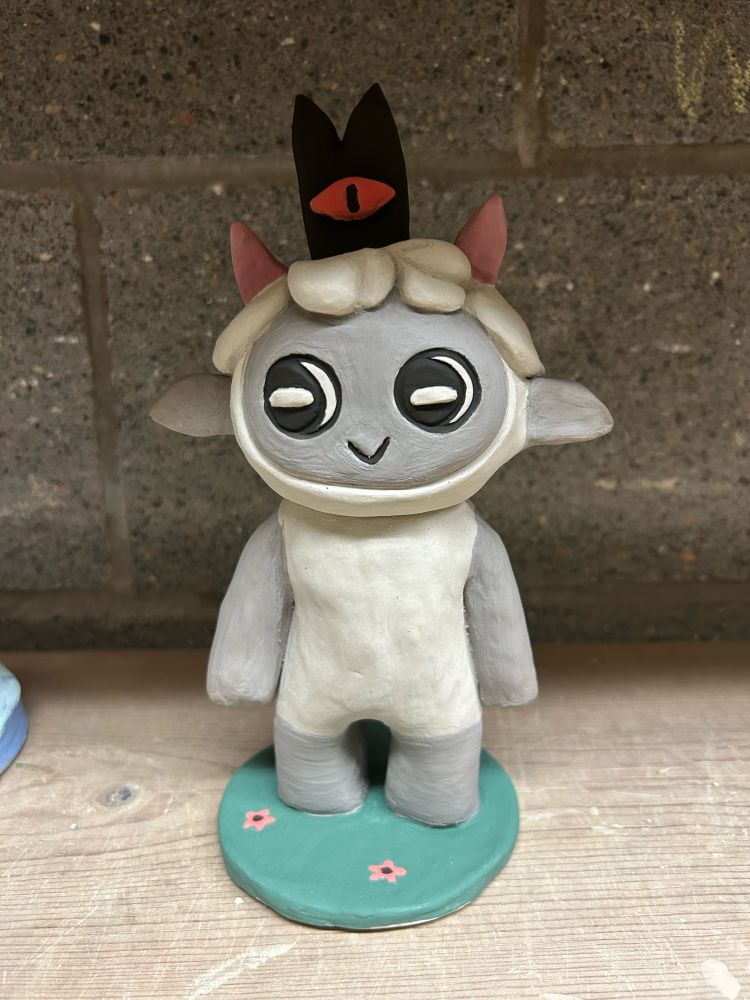 A porcelain Lambert figurine that I made myself in my ceramics course! Is still a work in progress.