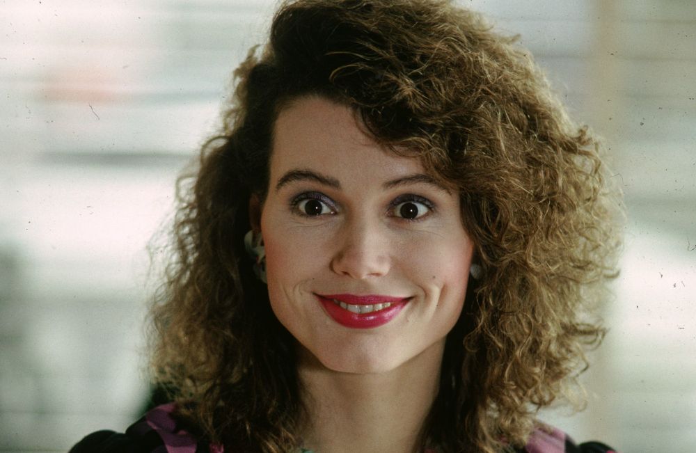 Geena Davis in 80's makeup in The Fly