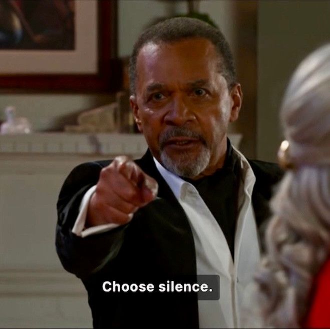 Vernon points at Dana/Leslie saying, Choose silence! 