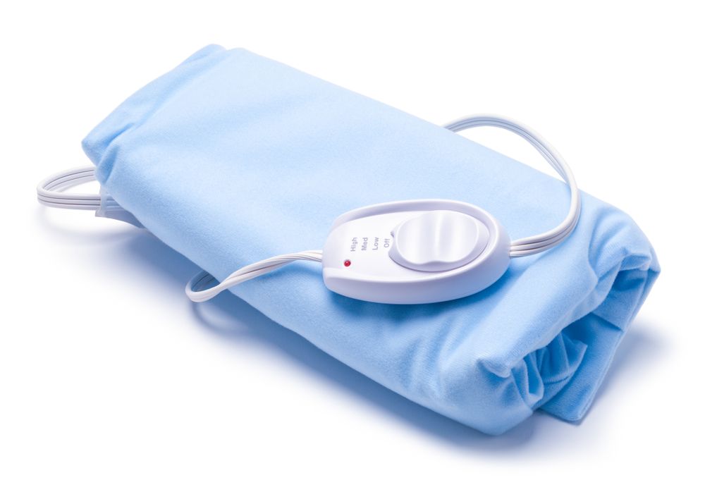Photo of a blue heating pad.