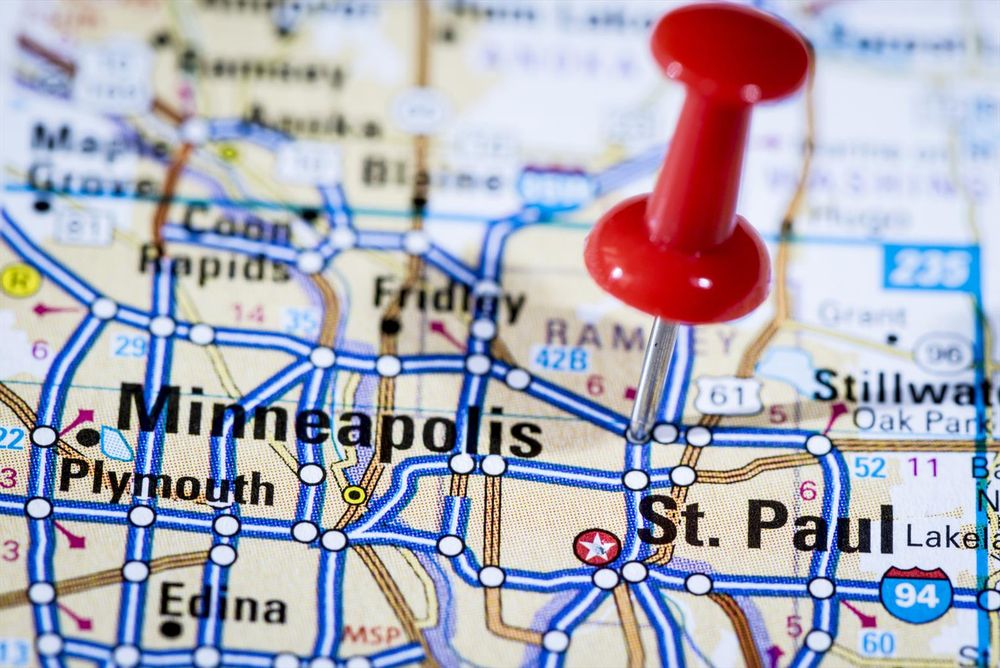 Closeup of Minneapolis on map with red pushpin.