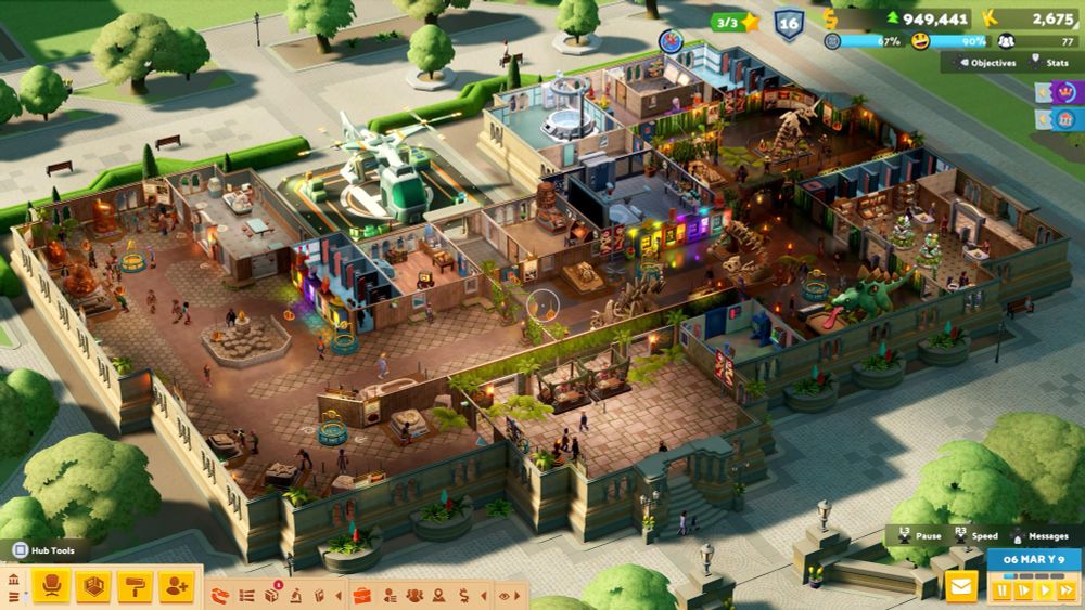 A wide elevated shot of a Prehistory sandbox museum in Two Point Museum