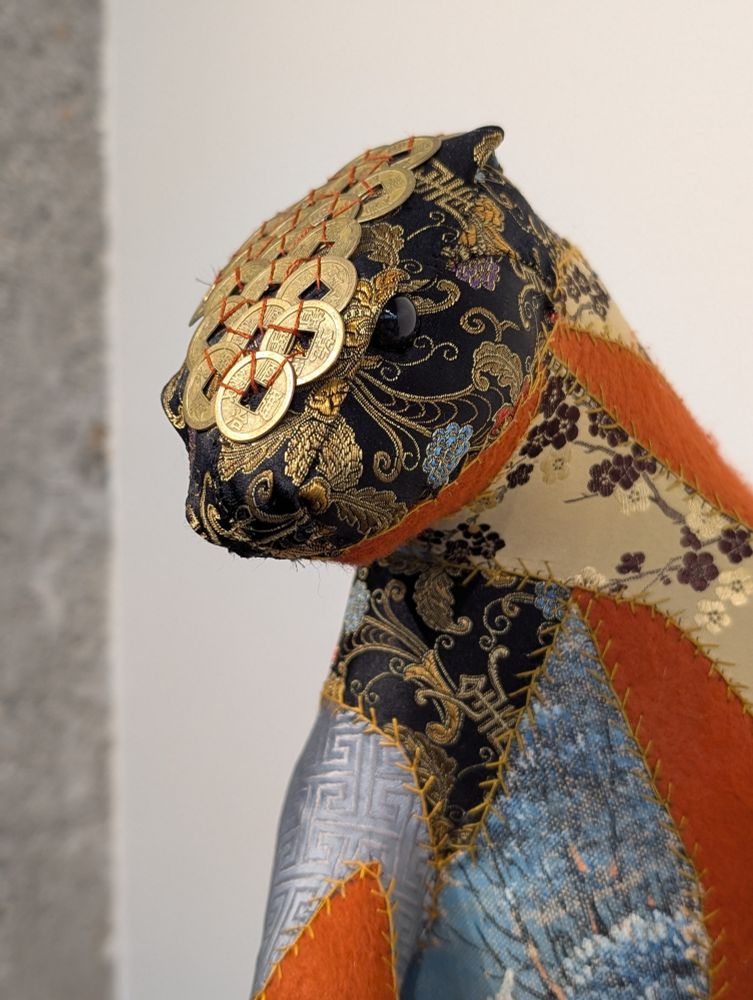 "Chinoiserie" in the sophisticated port of Canton, China, the hulls of ships were emptied of Alaskan sea otter furs and filled with tea, silk and porcelain...

Qing Dynasty coins, with holes in their centers were revered by Tlingits, embellishing regalia to shimmer when danced, and lining armor.