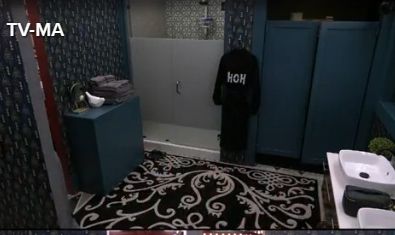 The Big Brother HoH bathroom with the HoH robe hanging from a hanger 