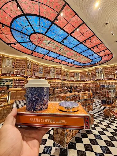 Decorative glass ceiling, walls covered in coffee from many countries.