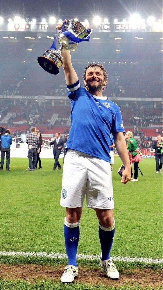 Michael Sheen with trophy at Soccer Aid