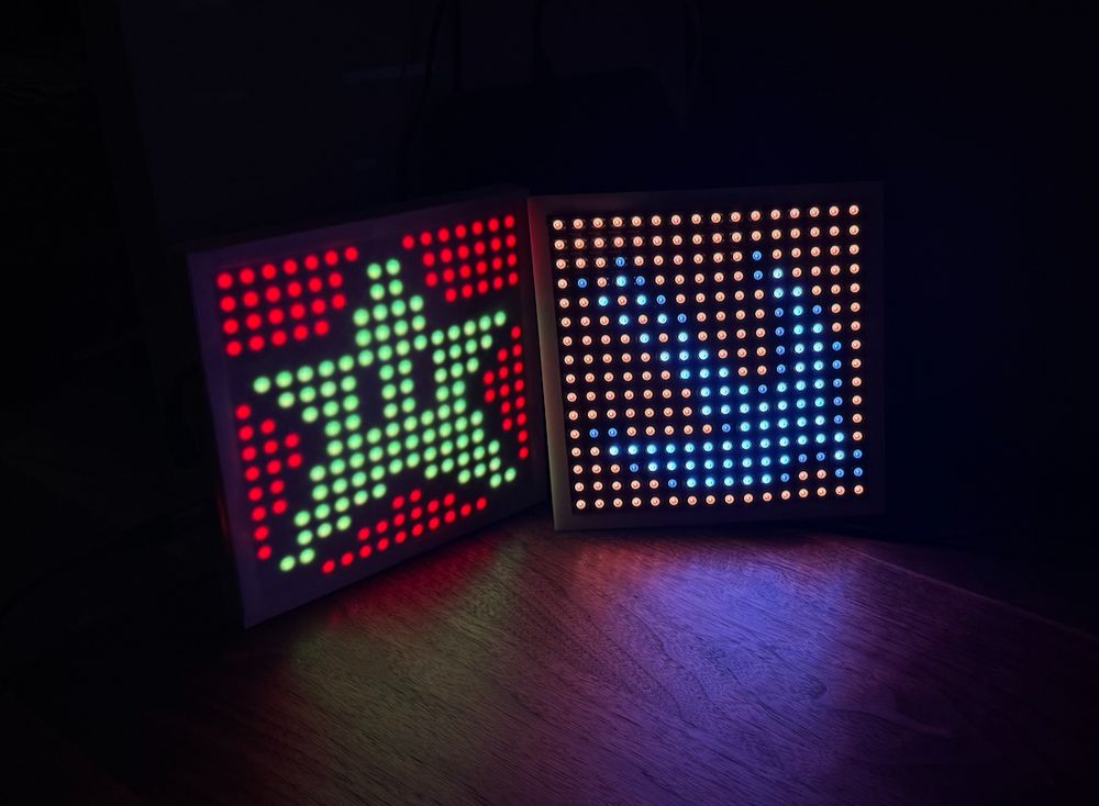 Last year’s panel (MicroPython) with this year’s prototype panel (Swift). These are 16x16 LED panels. One of them will go on top of our Christmas tree in a little more than a month.