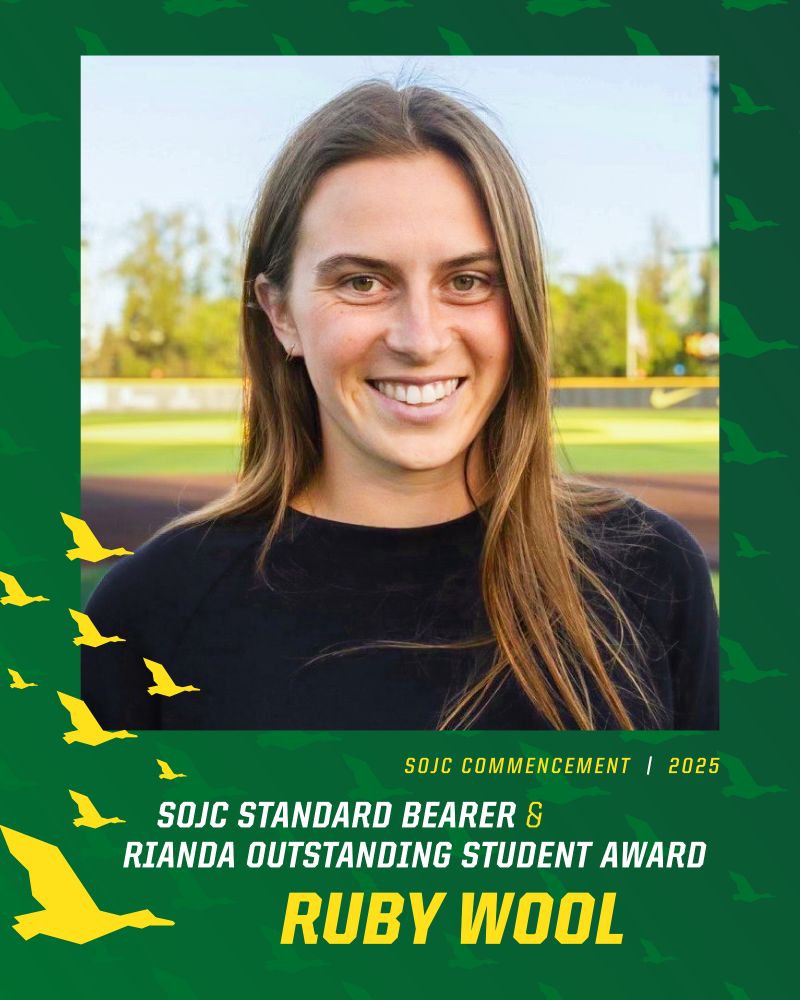 Portrait of Ruby Wool, recipient of the Rianda Outstanding Student Award and Standard Bearer for the SOJC Commencement 2025, smiling in front of a sports field background. The image features decorative green and yellow elements with flying duck silhouettes.