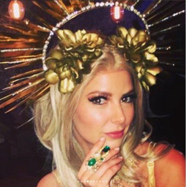 more recent ariana madix in a rly grand golden headset 