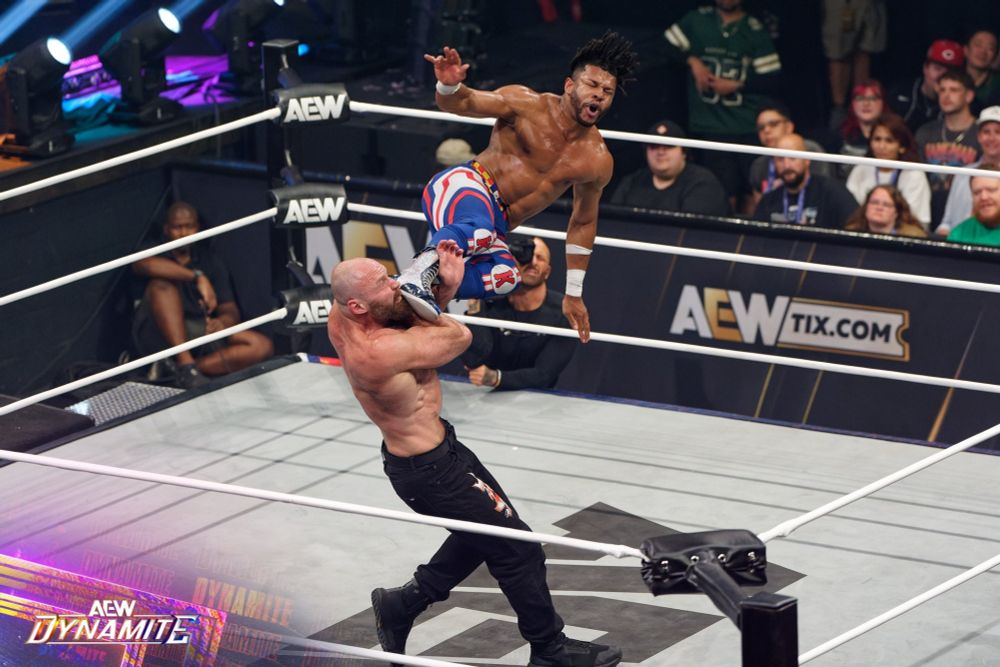 Kevin Knight dropkicking Mox on Dynamite 