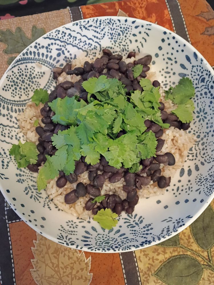 Brown rice, black beans, and cilantro.