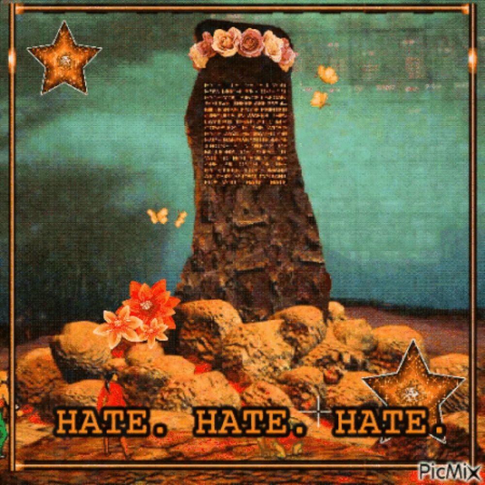 a picture of a tree stump with flowers on it and the words hate hate hate