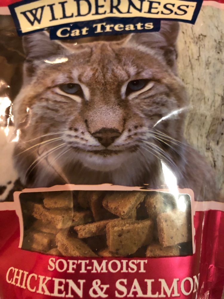 A bag of “wilderness” cat treats with a bobcat on the package 