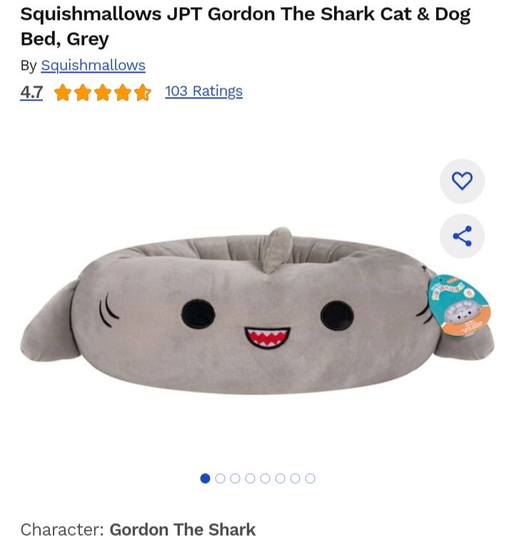 Screenshot of the "Gordon the Shark" Squishmallow pet bed, which bears more than a passing resemblance to trans icon and Ikea shark, blahaj. 