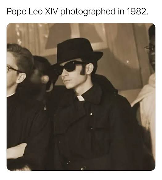 A picture of the Pope when he was a hot ass, blues brothers-lookin young priest