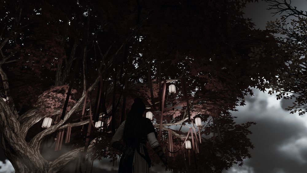 Low-angle, black-and-white screenshot of Ashrah in Where Winds Meet as she looks up at a Japanese maple tree.