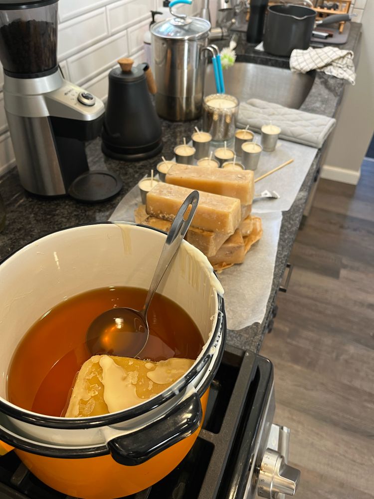 A double boiler with melting beeswax