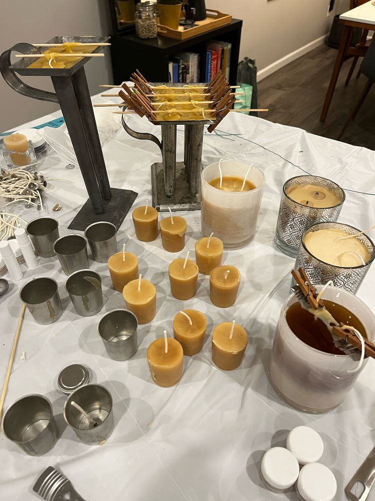 Tin molds and finished beeswax candles