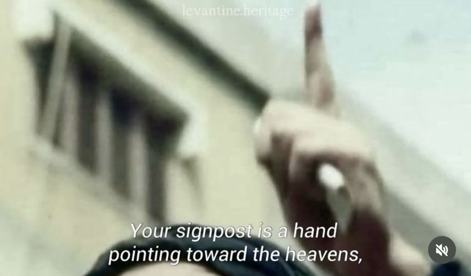 Nasrallah’s finger pointing in the air. You can only see the very top of his head 

This is the part about the signpost pointing toward the heavens 