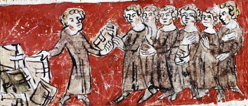 Enluminure médiévale montrant une distribution de livres à des étudiants