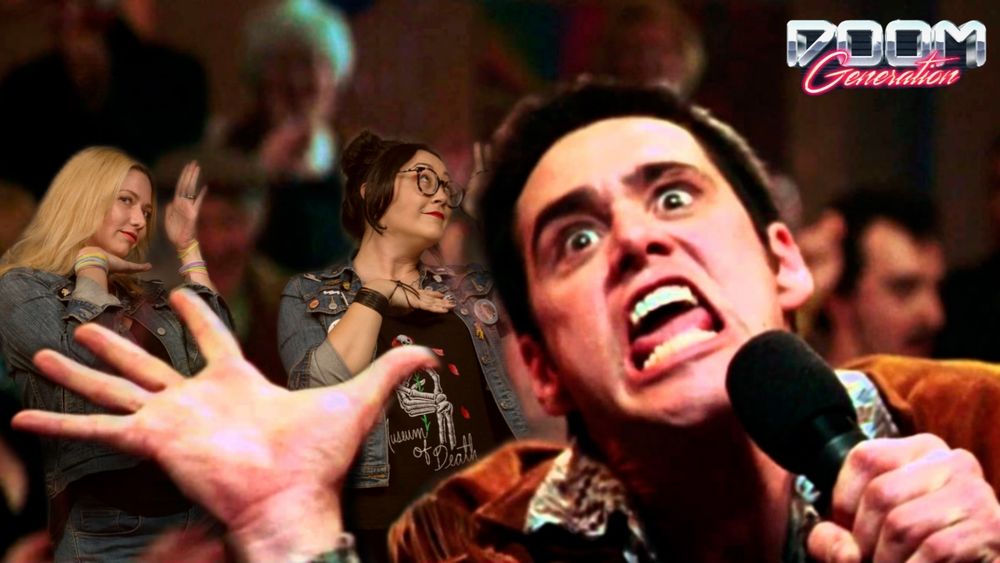 The Cable Guy singing karaoke while the Doom Dames dance behind him 