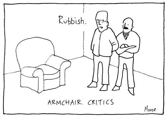 Cartoon: two men standing looking at an armchair. One is saying "Rubbish!". Caption: Armchair Critics