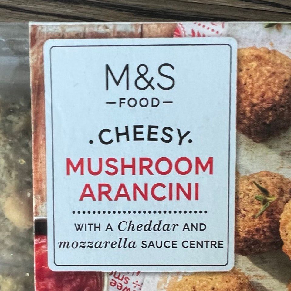 Photo of the packaging of M&S Cheesy Mushroom Arancini