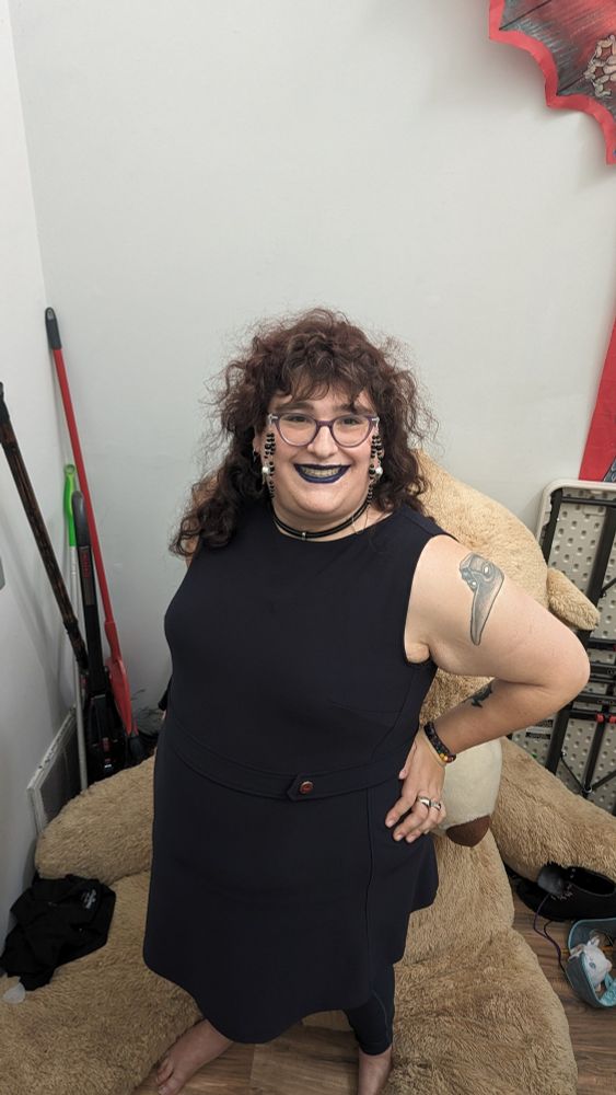 Trans woman in a blue dress