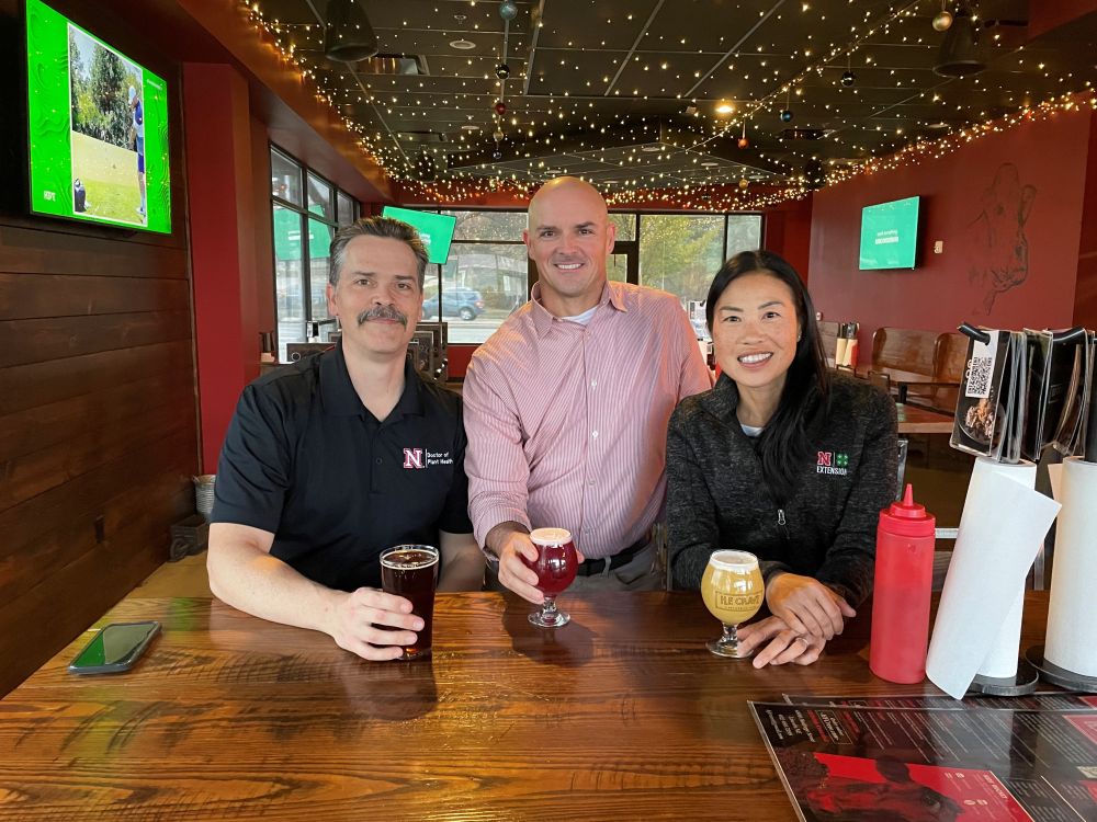 Jeff, Dave, and Jody enjoying some local brews.