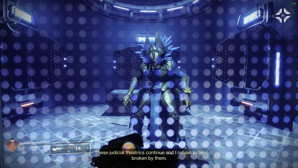 a screenshot of Destiny 2. Eramis, an alien with a spiky hat and spiky accessories, is in a cell behind a force-field wall (shown as dots in the image). She says "These judicial theatrics continue and I refuse to be broken by them."