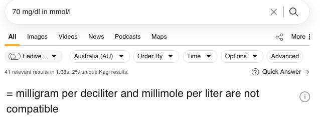 Kagi search window entry: "70 mg/d in mmol/l". Large-font answer under the heading "Quck Answer": "=milligram per deciliter and millimol per liter are not compatible".