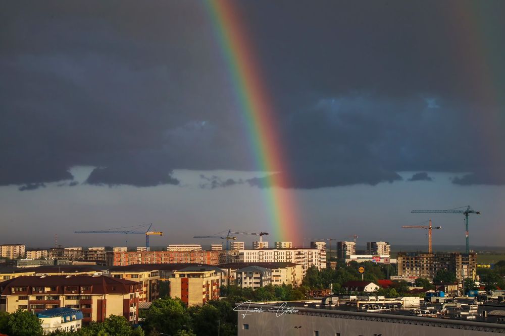 Rainbow over Bucharest. Not my photo.