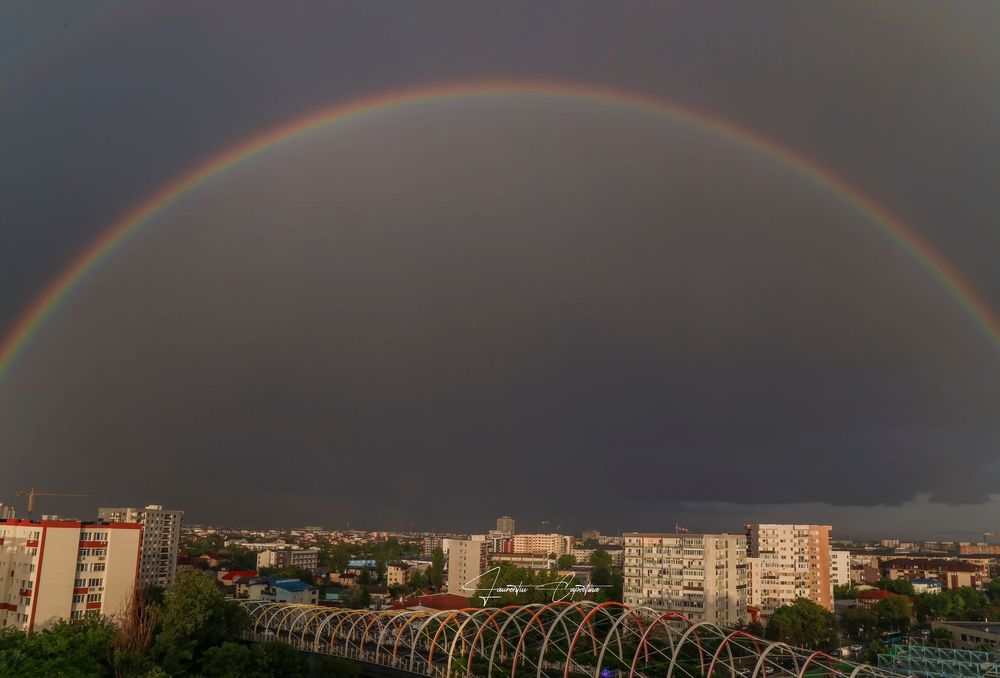 Rainbow over Bucharest. Not my photo.