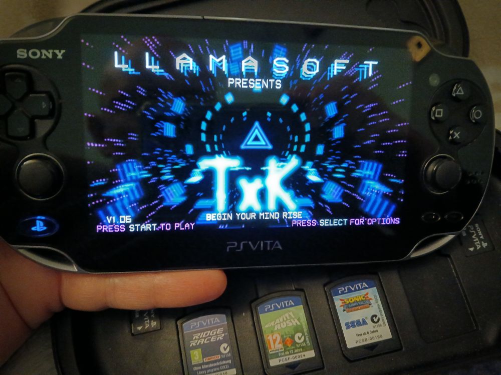 Llamasoft's TxK game running on a PS Vita.